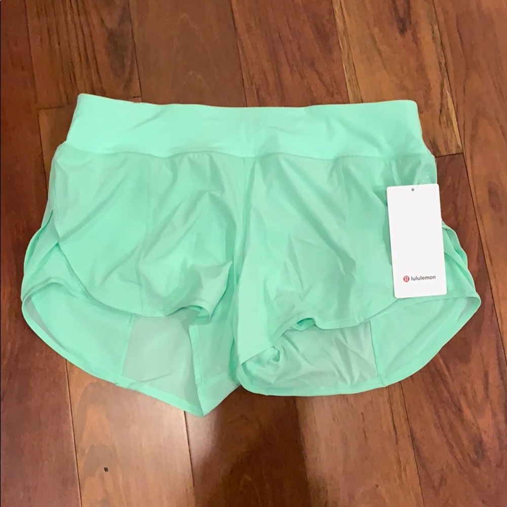 Attack the Track short 4", size 10 NWT